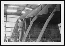 Boat under construction in a warehouse