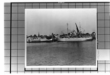 Exterior View-  Portside View of Unknown ship at dock.