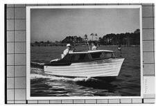 Small unknown boat moving.  Starboard Bow view.