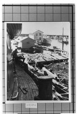 Unknown ship. Two men working on deck