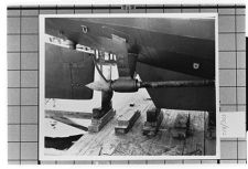 Unknown ship in dry dock.  Propeller