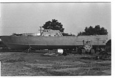 Osprey:  Portside view of boat on land