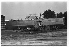 Osprey:  Portside view of boat on land