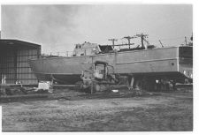 Osprey:  Portside view of boat on land