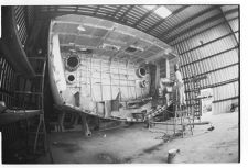 Osprey:  Working on the boat in the warehouse.