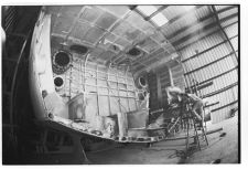 Working on the Osprey in warehouse.