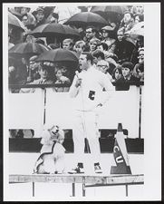 Cheerleader with poodle mascot