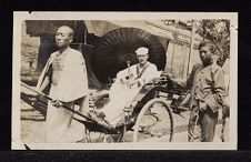 Man in a rickshaw in China