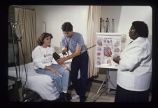 Medical student taking blood pressure