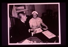 Man and nurse. Black and white photo.