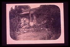 Man and woman on a porch. Black and white photo. 
