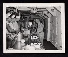 USS Saratoga birthday party, men receiving food in galley 