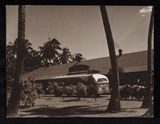 bus outside building, Hawaii. creator: Fields, Milton P.