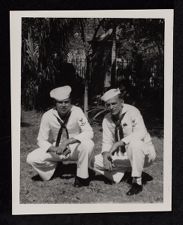 Various scenes of crewmen onboard and off ship