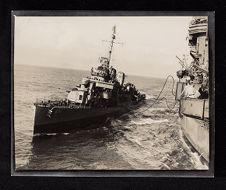 Various scenes of crewmen onboard and off ship