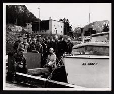 U.S. Coast Guard Auxiliary members by boat