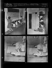 School Christmas art; women w- clothes in boxes (4 Negatives (December 18, 1959) [Sleeve 61, Folder d, Box 19]
