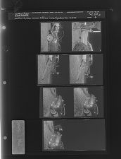 Officer investigating car wreck (7 Negatives), January 1-3, 1966 [Sleeve 6, Folder a, Box 39]