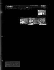 Woman checking P.O. Box (4 Negatives), January 17-18, 1966 [Sleeve 35, Folder a, Box 39]