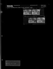 Older Couple looking at book (4 Negatives), April 11-13, 1966 [Sleeve 21, Folder d, Box 39]