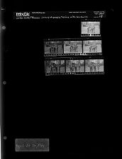 Group of people posing with tee shirts (7 Negatives), April 23-26, 1966 [Sleeve 58, Folder d, Box 39]