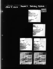 Rosalie's Saturday feature - man and woman looking at book (6 Negatives) (June 8, 1963) [Sleeve 17, Folder a, Box 30]