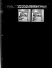 Col. Harry E. Hagarty at desk with woman (2 Negatives), May 4-5, 1964 [Sleeve 23, Folder a, Box 33]