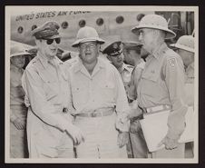 General MacArthur with 2 other officers.