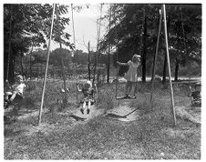 Children Playing on Swings