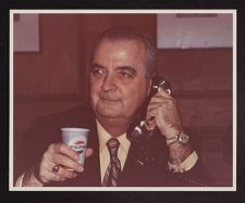 Dr. Jenkins holding a Pepsi-Cola cup