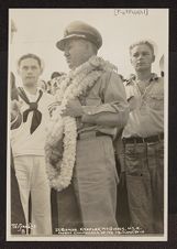 Lt. Cmdr. Knefler McGinnis and flight squadron personnel