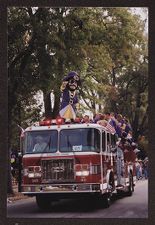 PeeDee and Cheerleaders on a Fire Truck