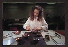 Woman Filing Bowls