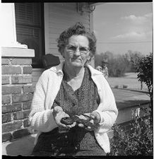 Woman holding artifacts