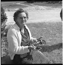 Woman holding artifacts