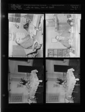 Lady at table, man at desk (4 Negatives (January 1955) [Sleeve 4, Folder c, Box 8]