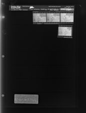 Two women looking at scrapbook/photo album (4 Negatives), October 6-7, 1966 [Sleeve 20, Folder c, Box 41]