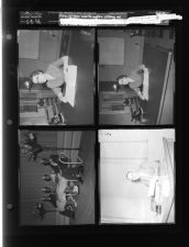 Mrs. Wilber Worthington sitting at desk; Man holding envelope; Black 4-H club (4 Negatives) (May 8, 1958) [Sleeve 21, Folder a, Box 15]
