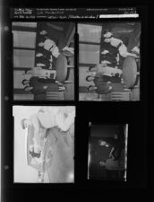 Man pointing at damage from chicken entering windshield; One woman giving another a piece of paper; Seven woman sitting and standing (4 Negatives) (February 14, 1958) [Sleeve 25, Folder b, Box 14]
