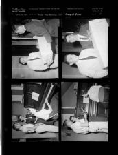 Young man receives gift; Group at piano (4 Negatives) (April 22, 1958) [Sleeve 21, Folder e, Box 14]