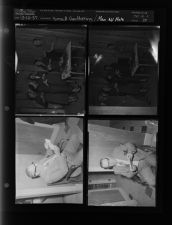 Small gathering; Man with note (4 Negatives) (December 12, 1957) [Sleeve 39, Folder c, Box 13]