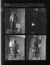 Wrecked car in garage (4 Negatives) (September 20, 1957) [Sleeve 16, Folder f, Box 12]