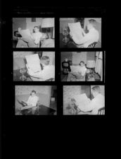 Man reading the Daily Reflector Newspaper (6 Negatives), March - July 1956, undated [Sleeve 47, Folder g, Box 10]