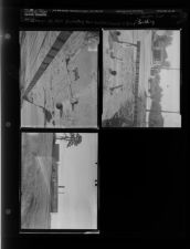 Installing new signal light across from Van's hardware; Health Department Building (3 Negatives (October 28, 1955) [Sleeve 47, Folder d, Box 7]