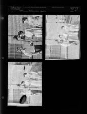 Check presentation between woman and man (3 Negatives) undated, 1954 [Sleeve 42, Folder a, Box 6]