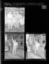 J. B. Smith Gives Check to man who lost house to fire on Bethel Highway; Snake killed (3 Negatives), May, 1954 [Sleeve 47, Folder b, Box 4]