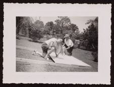 Photograph of a young Gregory Kosteck setting up a basketball goal