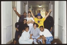 Students pose in a hallway