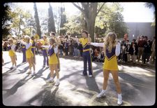 Cheerleaders performing in a parade