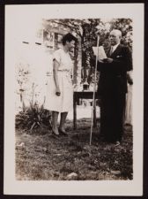 Woman and Man at a Microphone